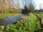 Pillhill Brook looking towards the Fisks' property and the river splits into two channels just after the bridge