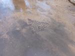 Flooding up through the man hole cover